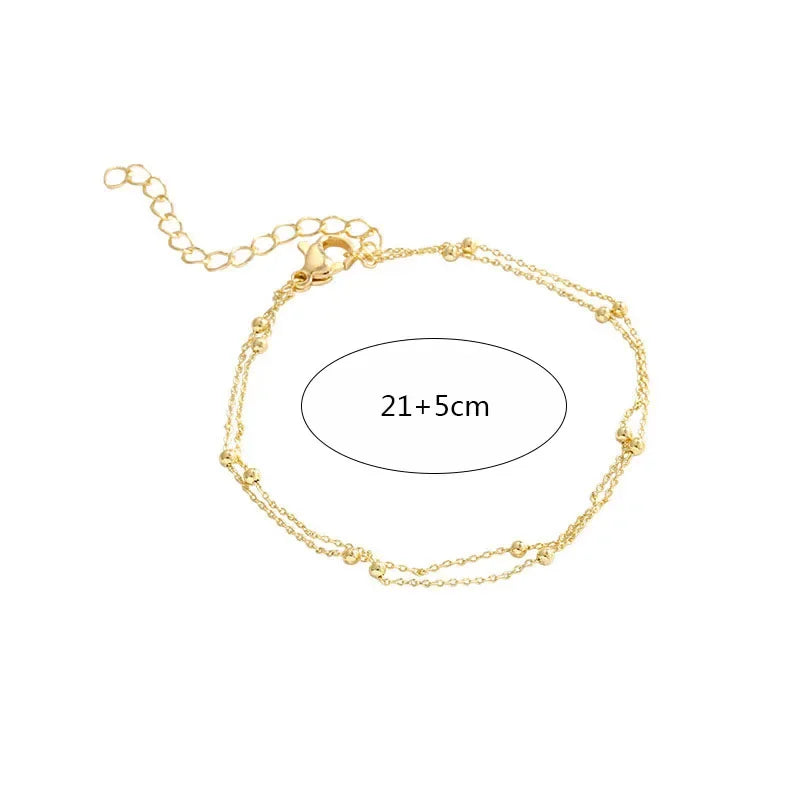 Bracelet double chaîne en doré