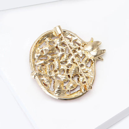 Broche grenade en cristal