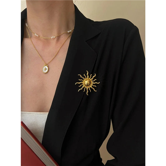 Broche soleil