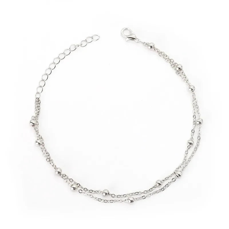 Bracelet double chaîne en doré