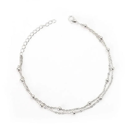 Bracelet double chaîne en doré