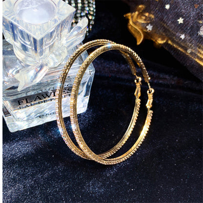 Boucles d'oreilles créoles en cristal douce