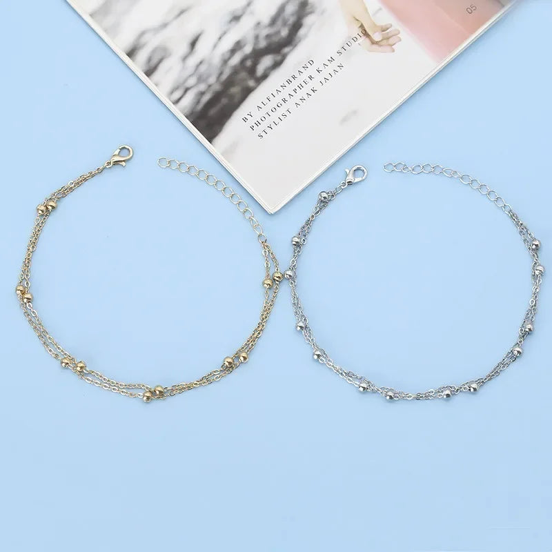Bracelet double chaîne en doré