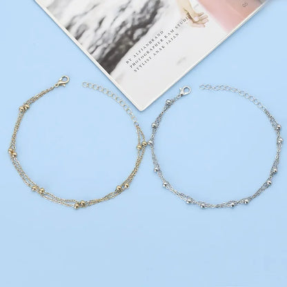 Bracelet double chaîne en doré
