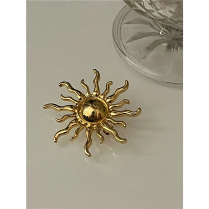 Broche soleil
