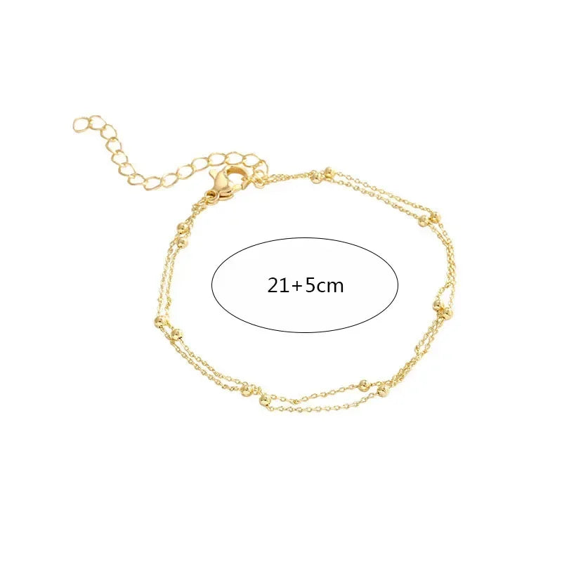 Bracelet double chaîne en doré