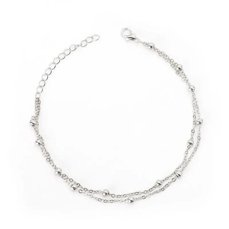 Bracelet double chaîne en doré