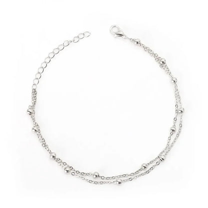 Bracelet double chaîne en doré