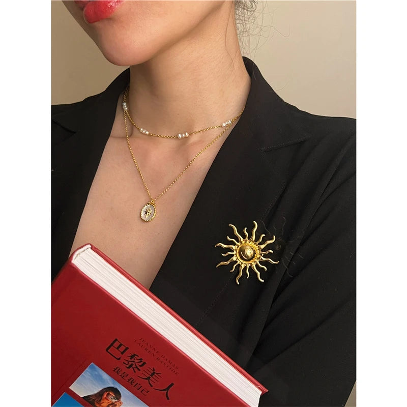 Broche soleil