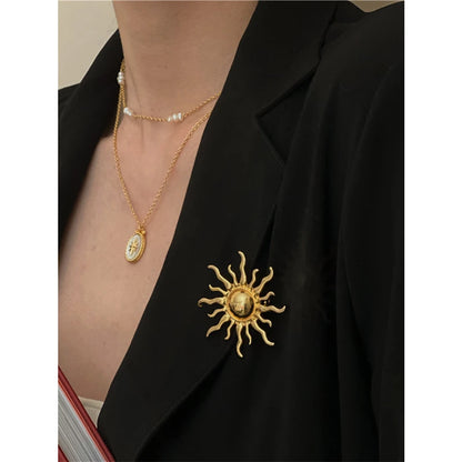 Broche soleil