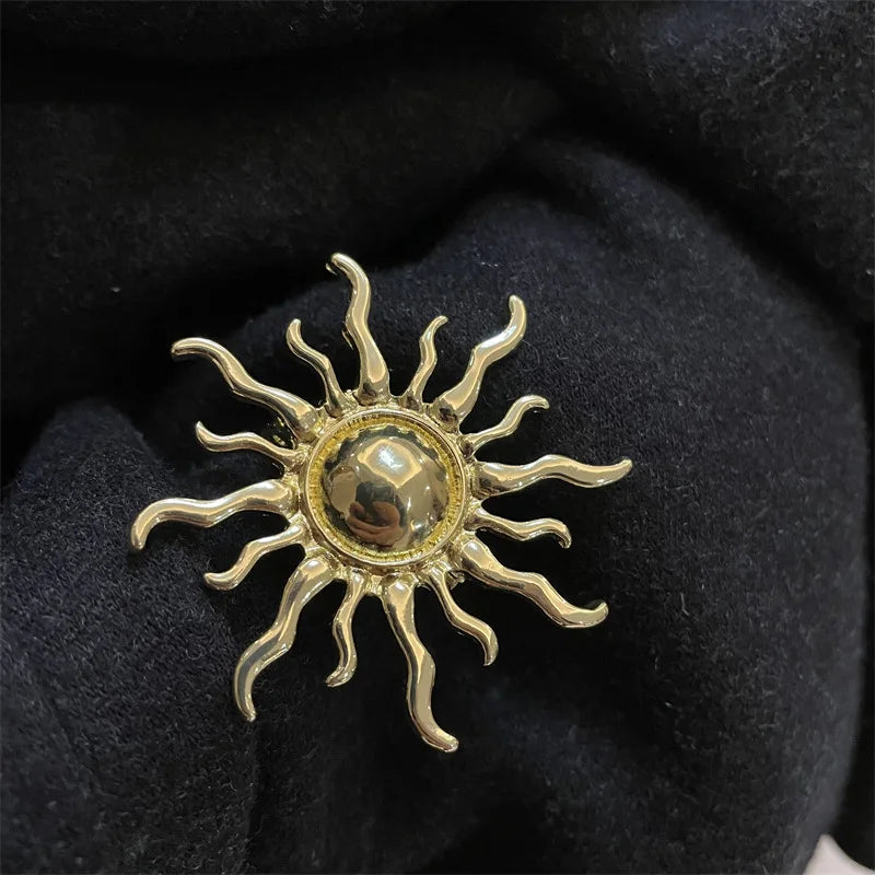 Broche soleil