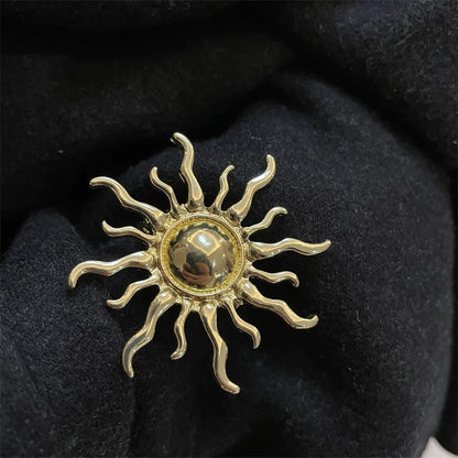 Broche soleil