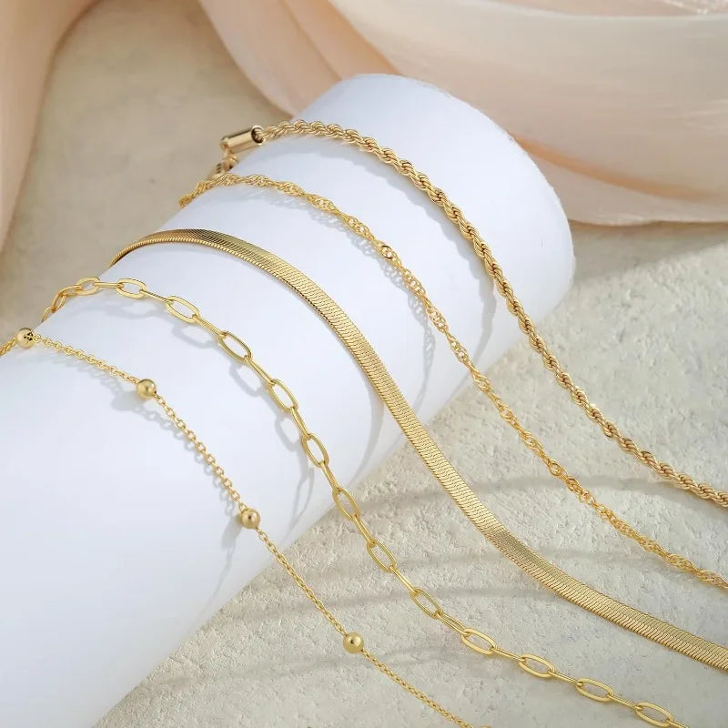 5 bracelets chaîne en plaqué or fine