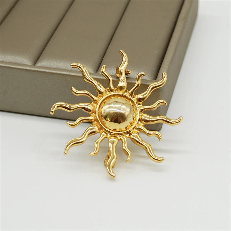 Broche soleil