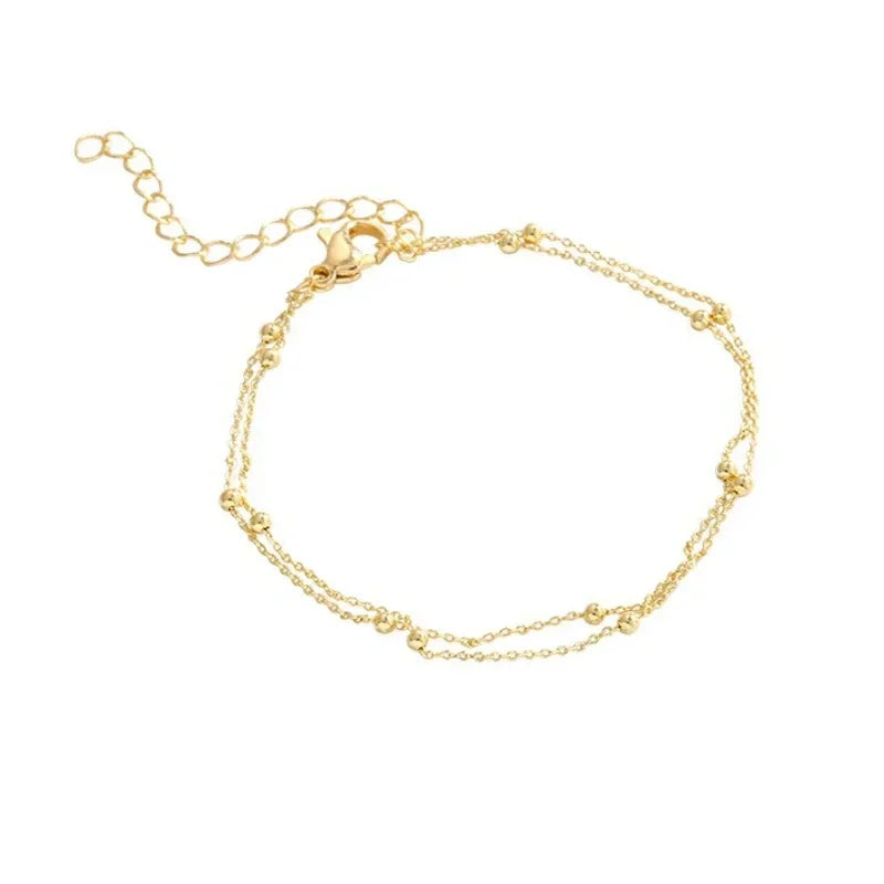 Bracelet double chaîne en doré