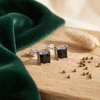 Boucles d'oreilles puces noires en argenté